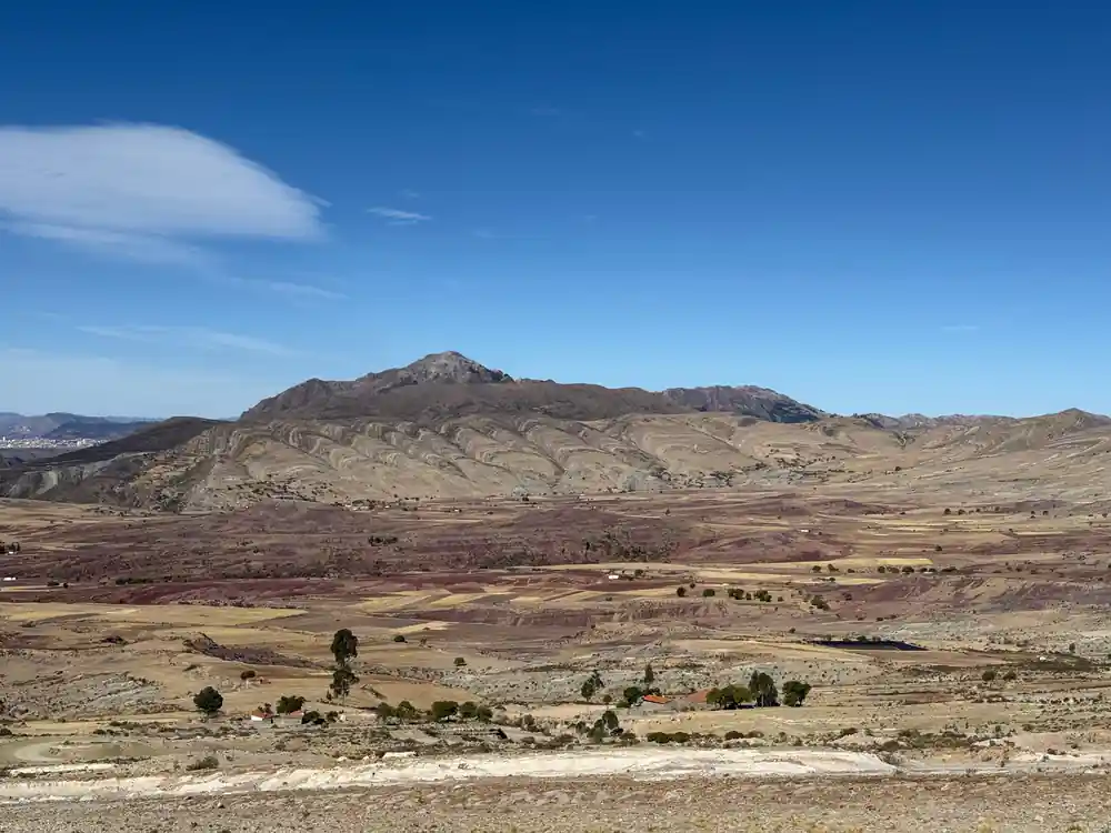 The crater floor and rim seen from high on the approach road